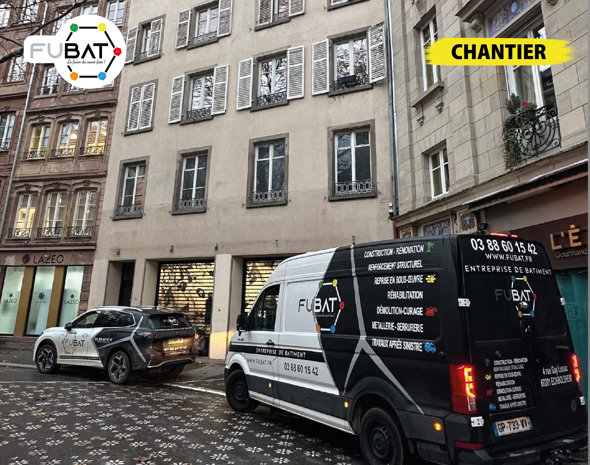 Véhicules FUBAT stationnés devant une entreprise à Strasbourg.